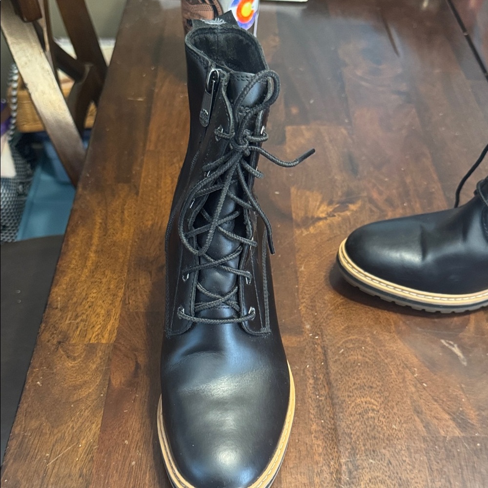 Sleek Black Leather Women’s Lace-Up Boots
New without box